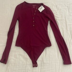 NWT burgundy body suit